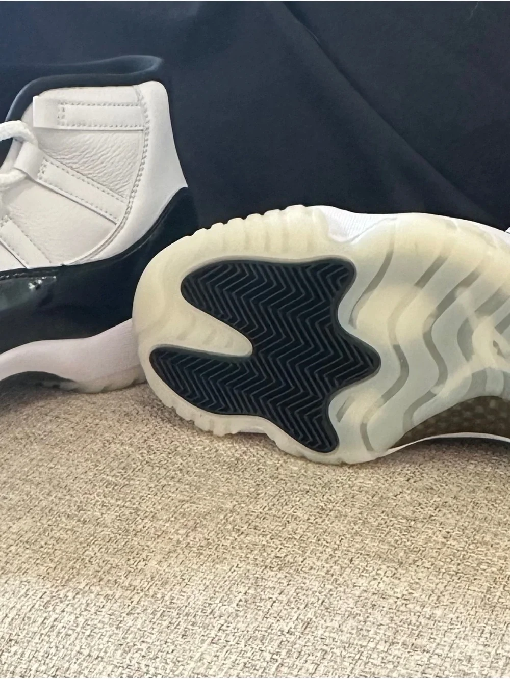 Air Jordan’s 11 Never Been Worn Black and White High-Top Athletic Sneakers